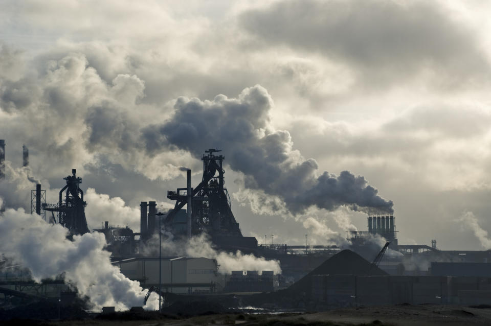 Lots of smoking chimneys in a dark environment