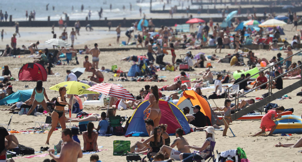Beachgoers were shown not adhering to social distancing rules. Source: AAP