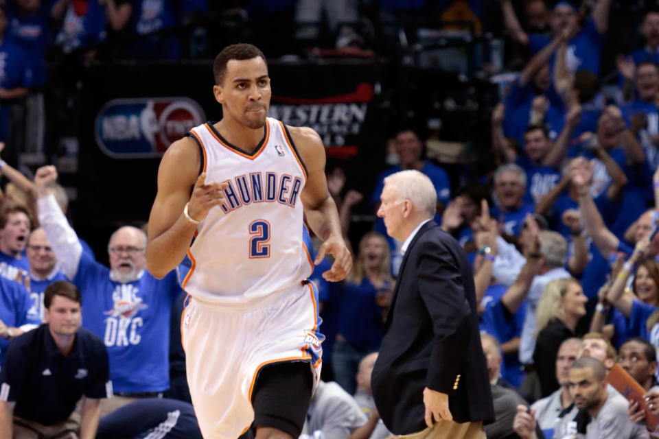 OKLAHOMA CITY, OK - MAY 31: Thabo Sefolosha #2 of the Oklahoma City Thunder reacts in the second half while taking on the San Antonio Spurs in Game Five of the Western Conference Finals of the 2012 NBA Playoffs at Chesapeake Energy Arena on May 31, 2012 in Oklahoma City, Oklahoma. NOTE TO USER: User expressly acknowledges and agrees that, by downloading and or using this photograph, User is consenting to the terms and conditions of the Getty Images License Agreement. (Photo by Brett Deering/Getty Images)