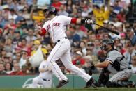 Jun 9, 2018; Boston, MA, USA; Boston Red Sox right fielder J.D. Martinez (28) follows through on his two-run home run against the Chicago White Sox during the fifth inning at Fenway Park. Mandatory Credit: Winslow Townson-USA TODAY Sports