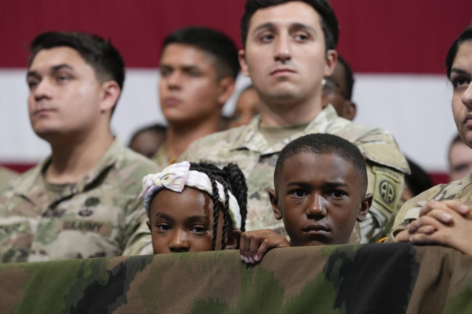 People listen as President Joe Biden speaks at Fort Liberty, N.C., Friday, June 9, 2023. (AP Photo/Susan Walsh)