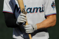 Miami Marlins' Matt Joyce holds a bat while standing at the on deck circle during the second inning in game one of a baseball double-header against the Baltimore Orioles, Wednesday, Aug. 5, 2020, in Baltimore. (AP Photo/Julio Cortez)