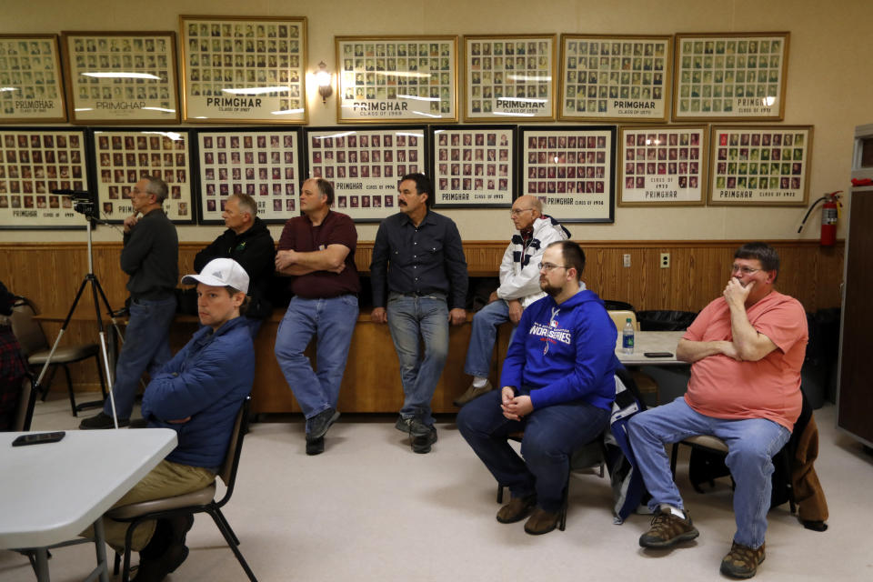 Local residents listen to U.S. Rep. Steve King, R-Iowa, speak during a town hall meeting, Saturday, Jan. 26, 2019, in Primghar, Iowa. King held the first of a promised 39 town hall meetings in his Iowa district since he made racist remarks during a newspaper interview this month that led to a formal rebuke and diminished role in Congress. (AP Photo/Charlie Neibergall)