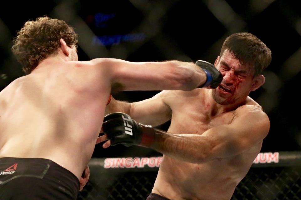 Demian Maia is punched by Ben Askren during their main-event fight at the UFC Fight Night event at Singapore Indoor Stadium. (PHOTO: Dhany Osman/Yahoo News Singapore)