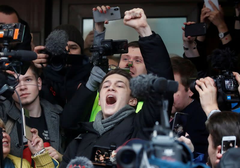 Russian protester Zhukov reacts after a court hearing in Moscow