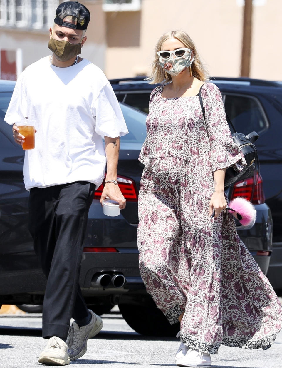 <p>Ashlee Simpson and husband Evan Ross wear their masks as they step out for a lunch in L.A. on Monday. </p>