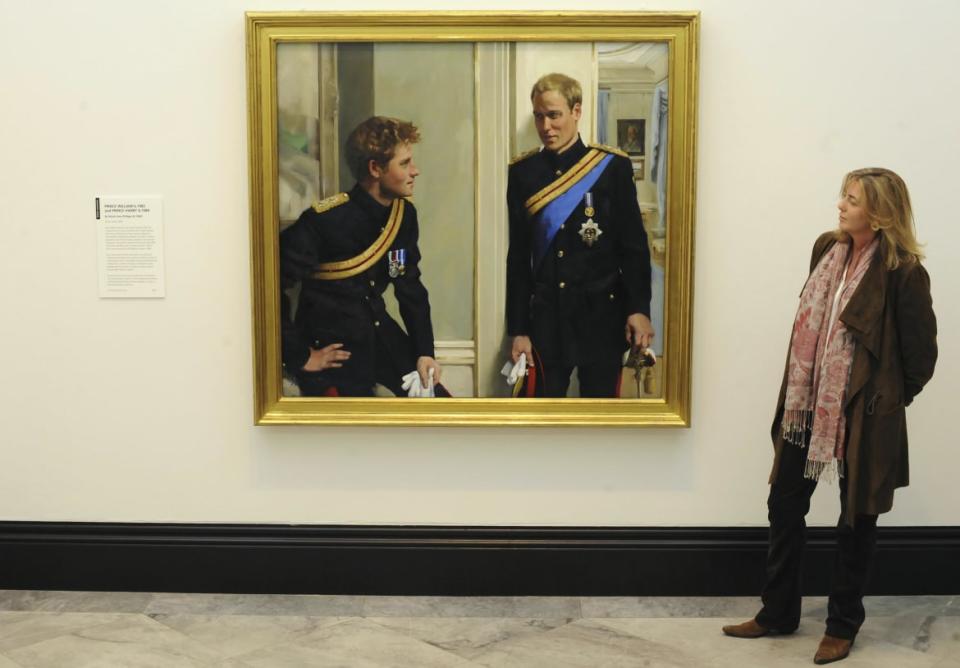 <div class="inline-image__caption"><p>Artist Nicky Philipps gestures as she talks about her double-portrait of Britain's Prince William and Prince Harry at the National Portrait Gallery in central London January 6, 2010.</p></div> <div class="inline-image__credit">REUTERS/Jas Lehal</div>