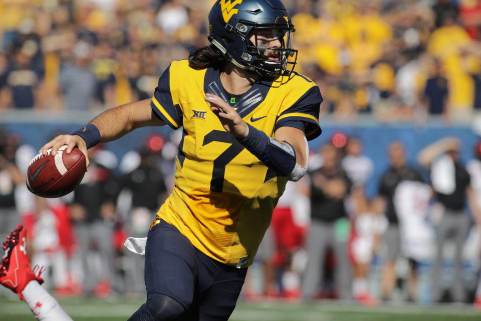 Will Grier (7) is back at West Virginia for his senior season. (AP Photo/Raymond Thompson, File)