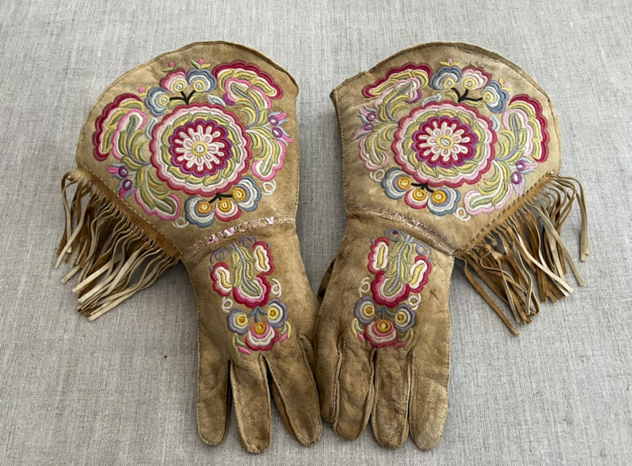 This undated photo provided on Wednesday, July 20, 2022, by Gregory Scofield, shows a pair of gauntlets he made in the late 19th-century Cree-Metif native Canadian traditional style. The Vatican's Anima Mundi Ethnological Museum houses tens of thousands of artifacts and art made by Indigenous peoples from around the world. The restitution of Indigenous and colonial-era artifacts, a pressing debate for museums and national collections across Europe, is one of the many agenda items awaiting Francis on his trip to Canada, which begins Sunday. (Gregory Scofield via AP)