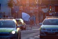 <p>A police forensics officer walks from the scene where a van is believed to have been involved in an incident near Finsbury Park Mosque in which the van ploughed into pedestrians, on June 19, 2017, in London, England. (Photo: Carl Court/Getty Images) </p>