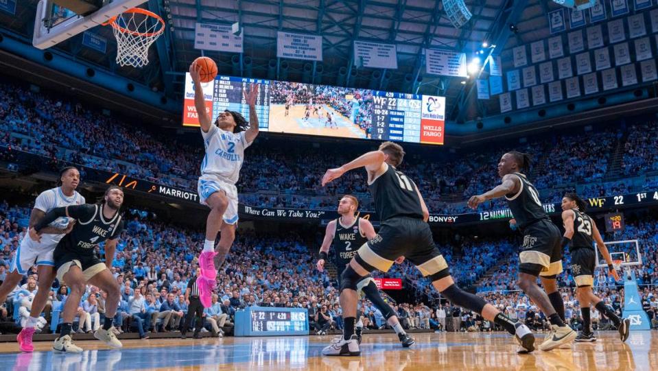 North Carolina’s Elliot Cadeau (2) breaks to the basket on a fast break in the first half against Wake Forest on Monday, January 22, 2024 at the Smith Center in Chapel Hill, N.C. Cadeau scored 14 points in the Tar Heels’ victory