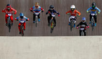 <p>Cyclists compete in the second semi-final of the BMX European Championship in Glasgow. (Reuters) </p>