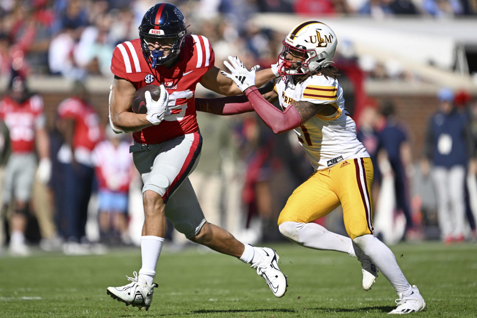 Mississippi tight end Caden Prieskorn (86) fights off Louisiana Monroe linebacker Ja'Terious Evans (27) during the second half of an NCAA college football game in Oxford, Miss., Saturday, Nov. 18, 2023. Mississippi won 35-3. (AP Photo/Thomas Graning)
