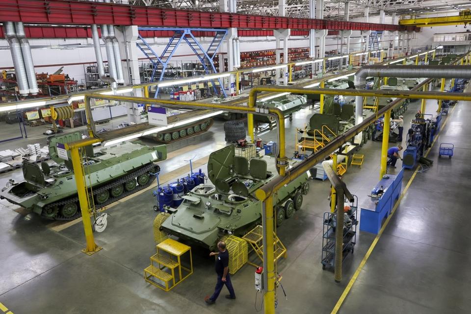 FILE - This photo released by the Russian Defense Ministry Press Service on July 11, 2023, shows a view of the factory for the production of military armored vehicles while Russian Defense Minister Sergei Shoigu visits the Central Military District, inspecting a defense order at enterprises in Tatarstan, Russia. Massive Russian spending for military equipment and hefty payments to volunteer soldiers are giving a strong boost to the economy. (Russian Defense Ministry Press Service via AP, File)