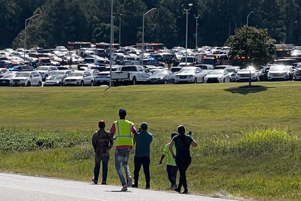 Students at Apalachee High School were evacuated to the football stadium after the campus was placed on lockdown following an active shooter situation (AP)