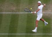 Britain Tennis - Wimbledon - All England Lawn Tennis & Croquet Club, Wimbledon, England - 2/7/16 Spain's Feliciano Lopez in action against Australia's Nick Kyrgios REUTERS/Paul Childs