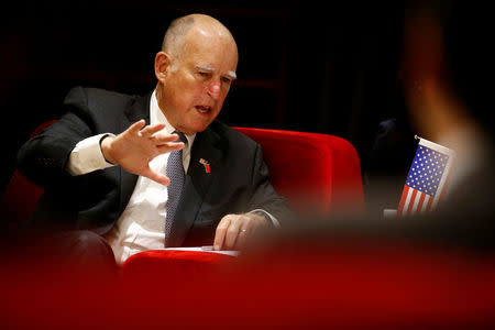 California Governor Jerry Brown attends the International Forum on Electric Vehicle Pilot Cities and Industrial Development in Beijing, China June 6, 2017. REUTERS/Thomas Peter