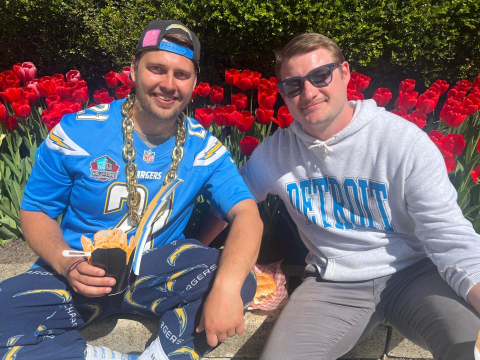 Kevin Sabres, left, took off work Thursday and Friday from his job in Chicago to attend the 2024 NFL draft. But when he arrived Thursday evening, he was turned away: The event had reached capacity. While it was disheartening, he and his friend Johnathan Kingman, 27, arrived at the event much earlier Friday.