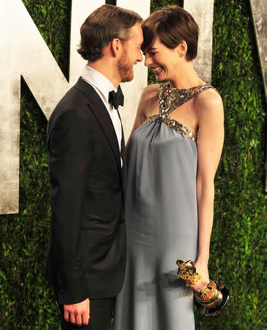 <p>Mark Sullivan/WireImage</p> Adam Shulman and Anne Hathaway