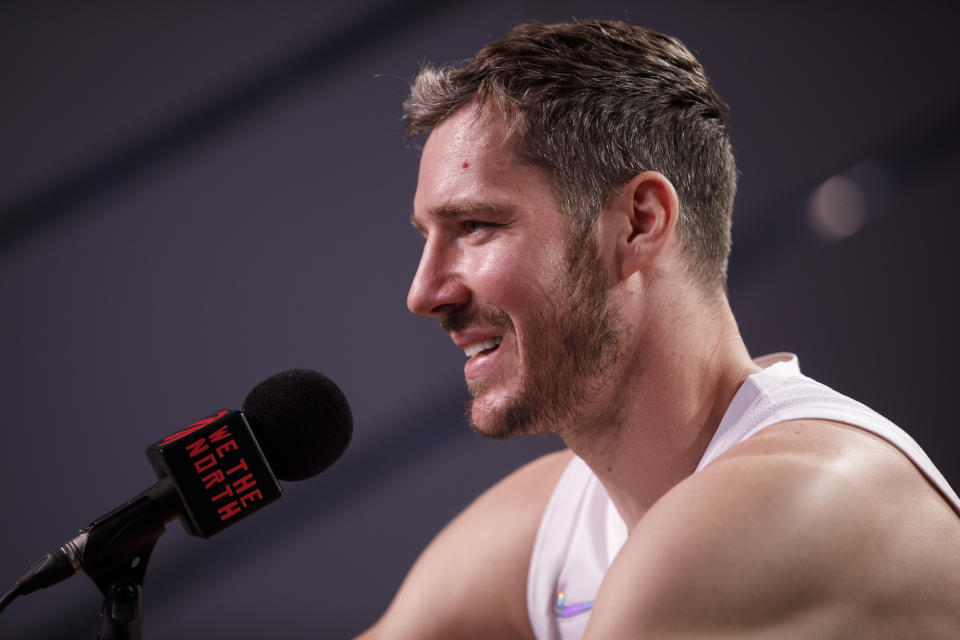 Toronto Raptors' Goran Dragic speaks to media at Scotiabank Arena during the NBA basketball team's Media Day in Toronto, Monday, Sept. 27, 2021. (Cole Burston/The Canadian Press via AP)