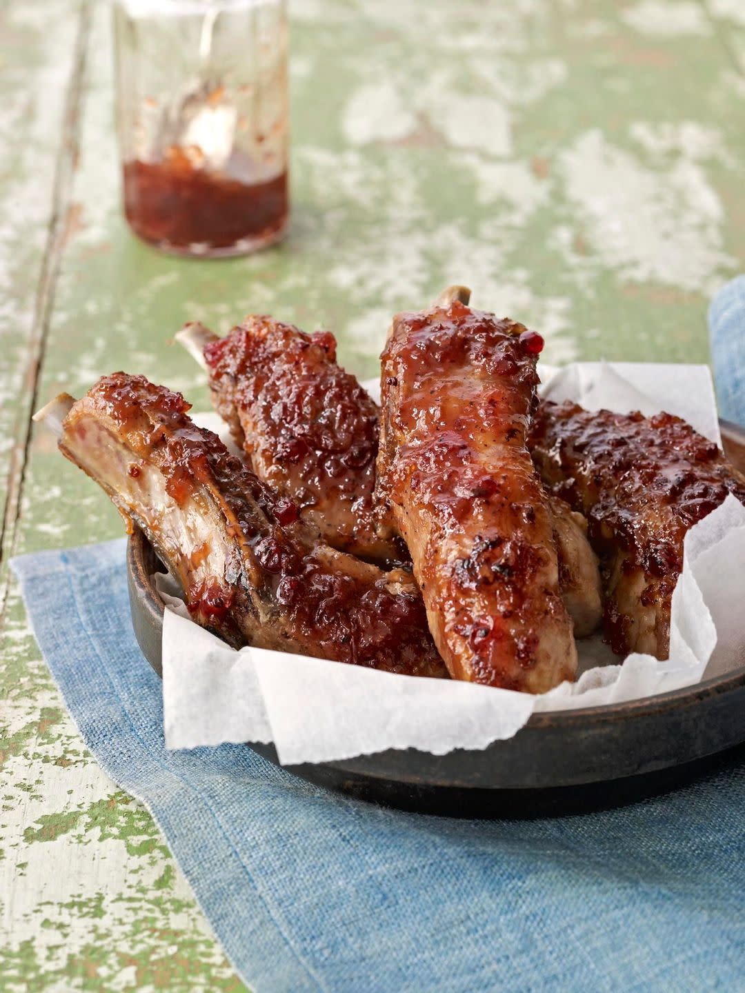 glazed country ribs in a parchment lined serving dish