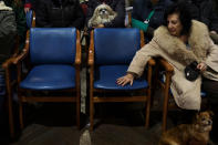 <p>People and their pets sit listen to a mass at San Anton Church in Madrid, Spain, Jan. 17, 2018. (Photo: Susana Vera/Reuters) </p>