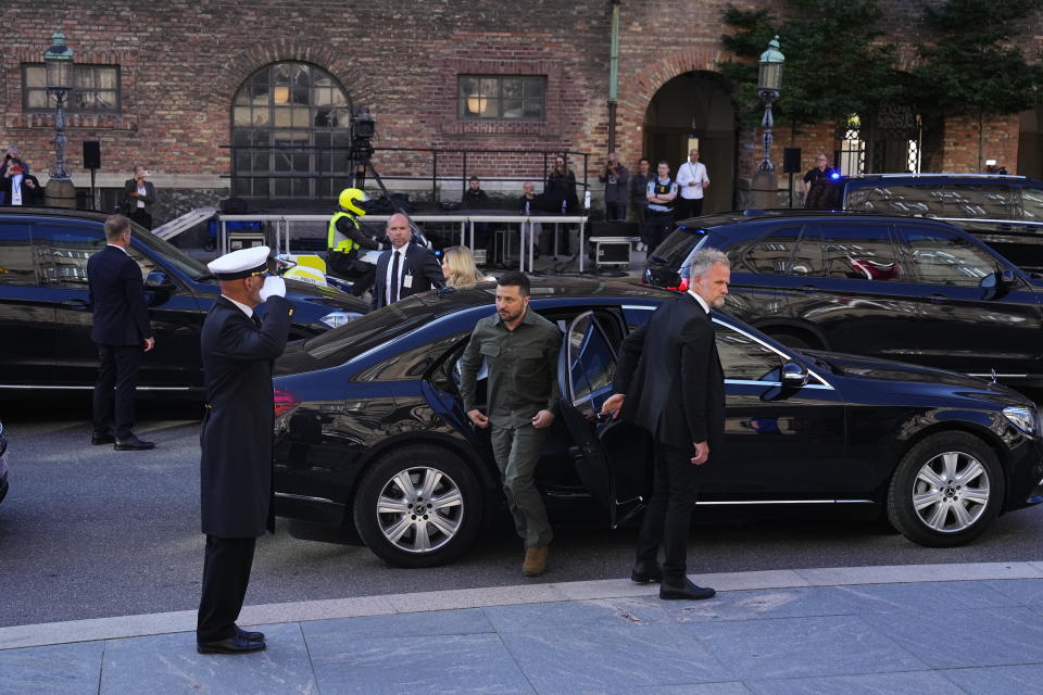 Ukraine's President Volodymyr Zelenskyy and Ukraine's First Lady Olena Zelenska arrive at the Danish Parliament in Copenhagen, Monday Aug. 21, 2023. (Claus Bech/Ritzau Scanpix via AP)