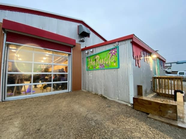 The new Red Fish Arts studio has opened at what was the fish plant in the 1950s and aims to teach community members a mixture of welding and other art. It is funded in part by the Arctic Inspiration Prize won by Nunavut youth in 2018. (Submitted by Marla Limousin - image credit)