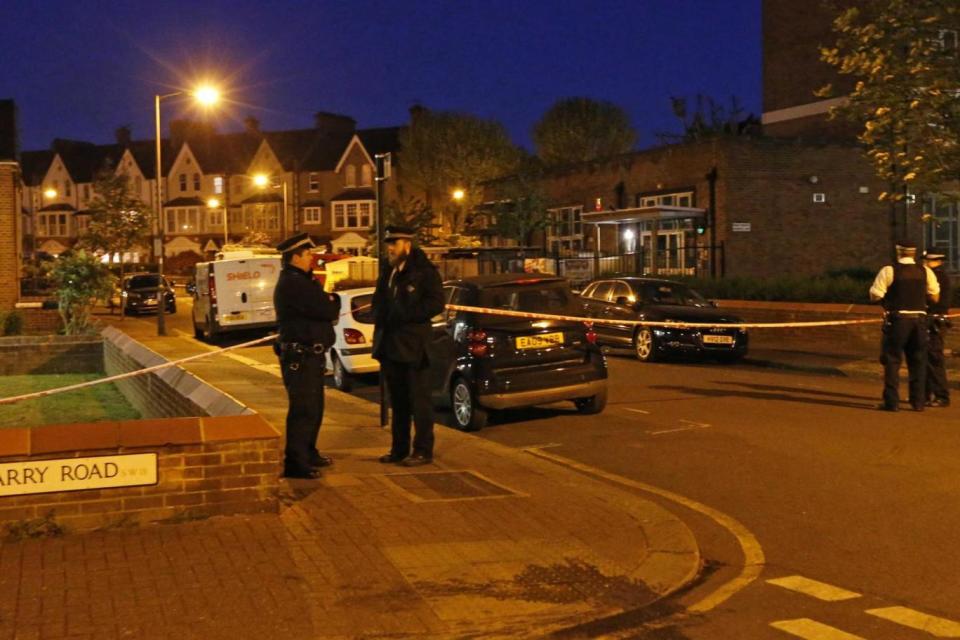 Police cordon: the scene in Wandsworth after the stabbing (NIGEL HOWARD)