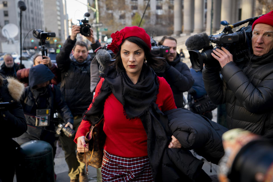 Sarah Ransome, an alleged victim of Jeffrey Epstein and Ghislaine Maxwell, arrives to the courthouse for the start of Maxwell's trial in New York, Monday, Nov. 29, 2021. Maxwell, who once dated the financier — is accused of acting as Epstein's chief enabler, recruiting and grooming young girls for him to abuse. (AP Photo/John Minchillo)