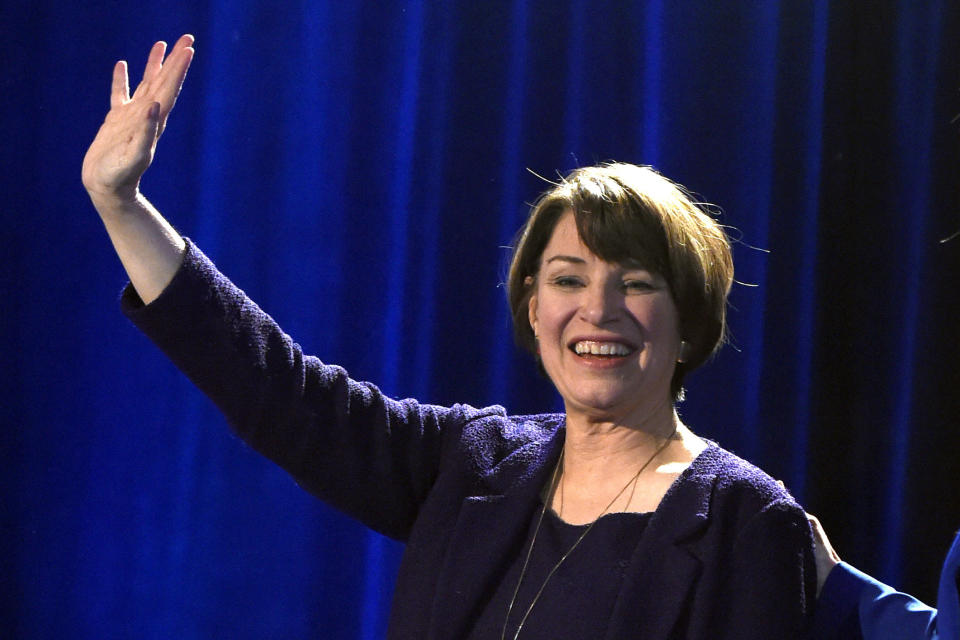 FILE - In this Nov. 6, 2018, file photo, Sen. Amy Klobuchar waves to supporters after winning re-election during the Democratic election night party in St. Paul, Minn. Klobuchar will be in Iowa on Saturday, Dec. 1, 2018. As potential Democratic White House hopefuls begin making trips to Iowa, the party will have to decide whether a pragmatist has a better chance to take the White House than someone with a more inspirational personal story. (AP Photo/Hannah Foslien, File)