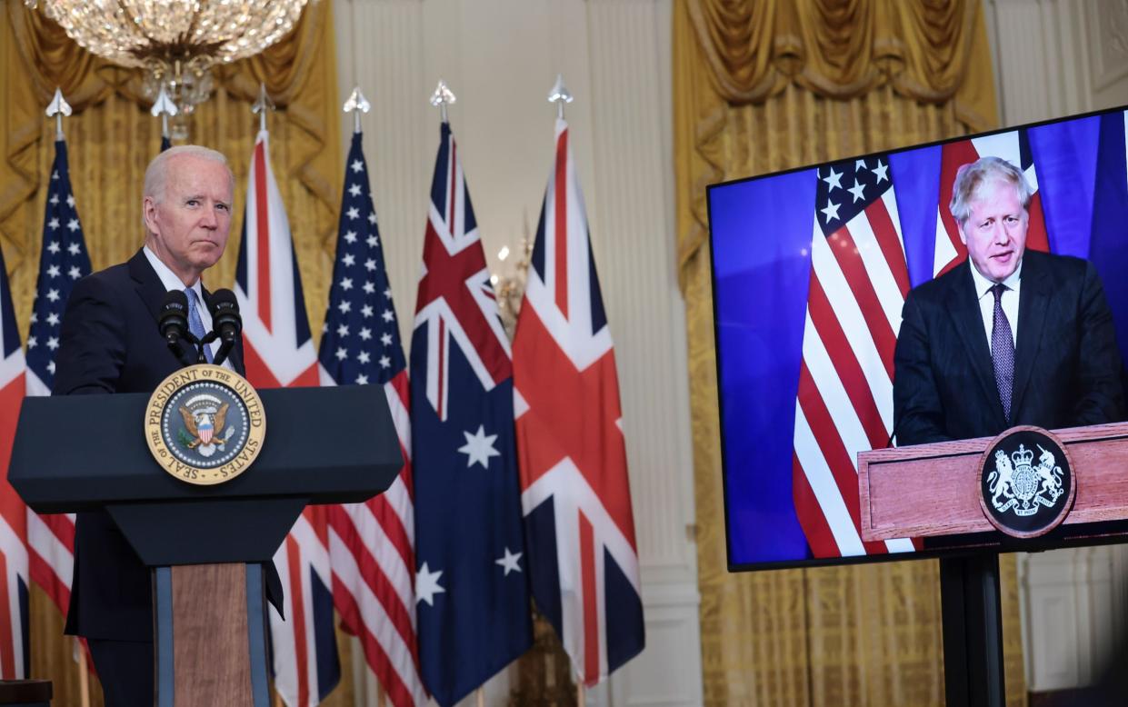 President Joe Biden participates in a virtual press conference in the White House with British Prime Minister Boris Johnson - Oliver Contreras