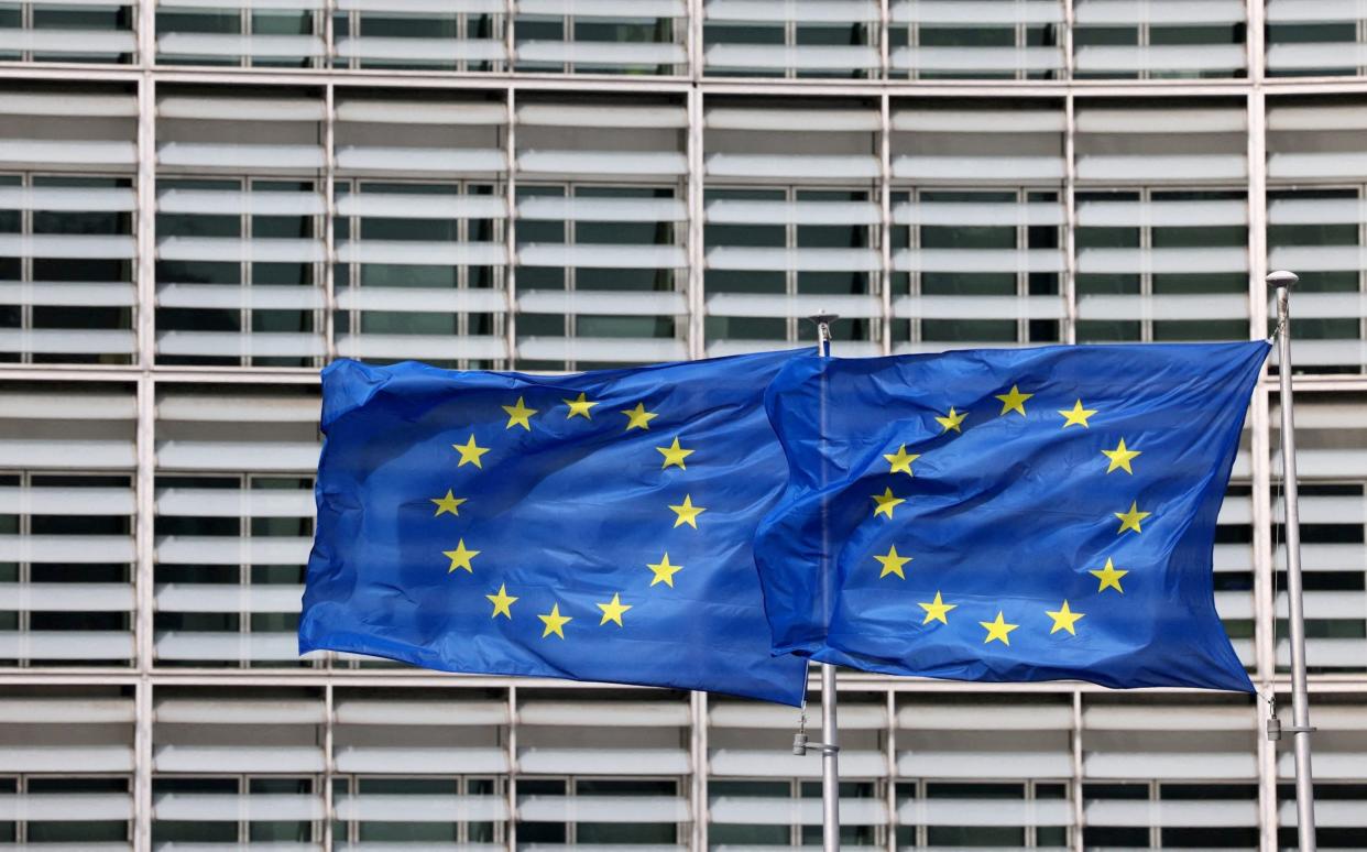 European flags fly outside the European Commission headquarters in Brussels - YVES HERMAN/REUTERS