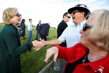 Former U.S. Secretary of State Hillary Clinton greets supporters at the 37th Harkin Steak Fry in Indianola, Iowa September 14, 2014. REUTERS/Jim Young