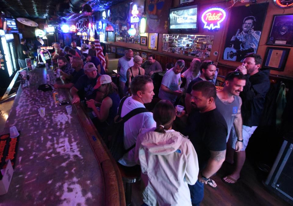 People filled the Barbary Coast in downtown Wilmington, N.C., Thursday, September 13, 2018. The bar is best known for its role in the David Lynch film "Blue Velvet."