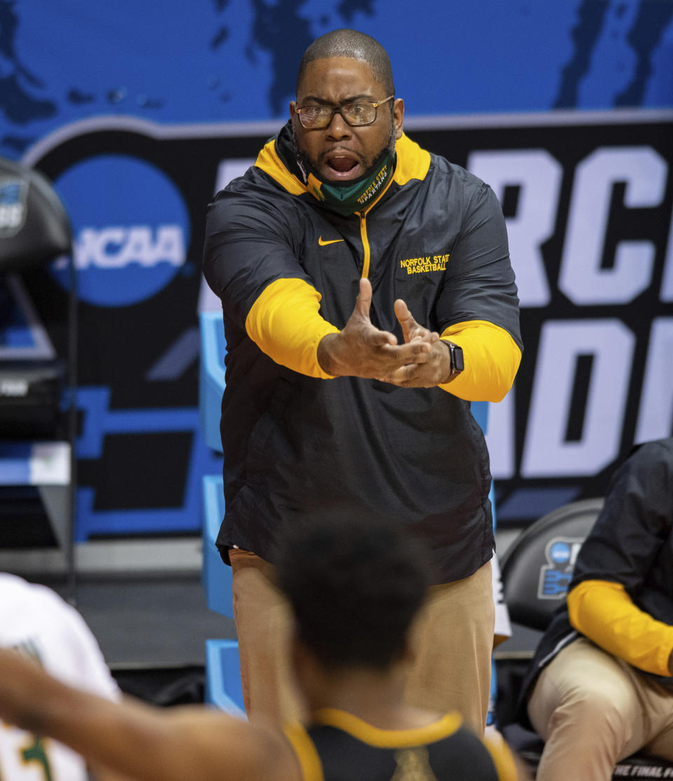 Norfolk State head coach Robert Jones reacts to the action on the court during the first half of a First Four game against Appalachian State in the NCAA men's college basketball tournament, Thursday, March 18, 2021, in Bloomington, Ind. (AP Photo/Doug McSchooler)
