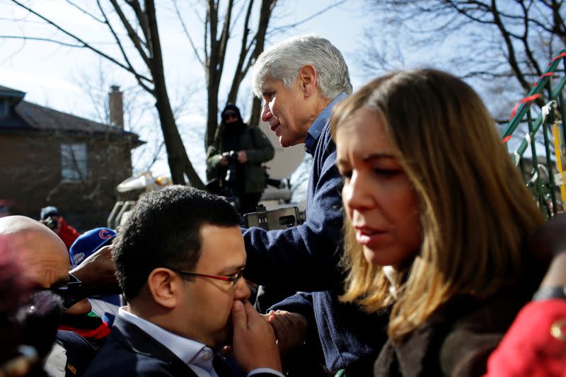 Patti Blagojevich and Rod Blagojevich greets supporters outside his home after U.S. President Donald Trump commuted his prison sentence, in Chicago