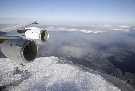 NASA's DC-8 flies over the Brunt Ice Shelf in Antarctica October 26, 2010 in this handout photo provided by NASA, March 26, 2015. REUTERS/Michael Studinger/ NASA/handout via Reuters