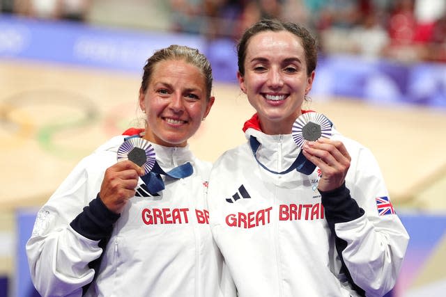 Neah Evans, left, and Elinor Barker with their silver medals