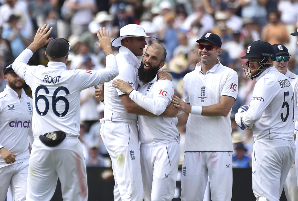 England's Moeen Ali, centre right, celebrates with teammates after bowling Australia's Cameron Green, during day two of the first Ashes Test cricket match between England and Australia at Edgbaston, Birmingham, England, Saturday, June 17, 2023. (AP Photo/Rui Vieira)