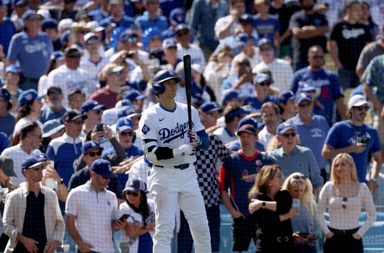 Shohei Ohtani waits to hit against the Cardinals.