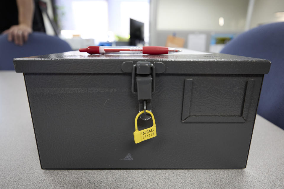 The sealed box containing the tabulated test ballots after a logic and accuracy test that is done in all Washington counties is displayed Thursday, Oct. 13, 2022, in Shelton, Wash. (AP Photo/John Froschauer)