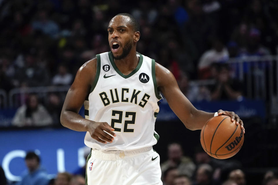 Milwaukee Bucks forward Khris Middleton played just his eighth game this season in Monday's win over the Detroit Pistons.  His return puts the Bucks in realistic title contention.  (AP Photo/Paul Sancy)