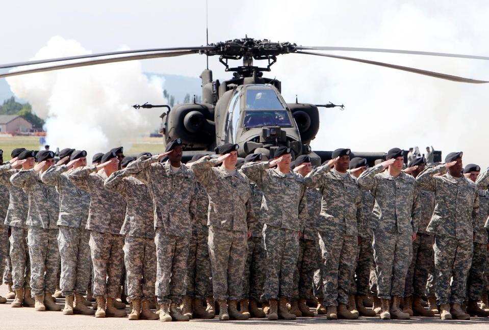 Soldiers of 1AD attend a color casing ceremony of the First Armored Division at the US Army Airfield in Wiesbaden, Germany on May 13, 2011.  Germany on June 7, 2020, voiced concern at reports that US President Donald Trump plans to cut the number of US troops stationed in Germany, amid fears it could weaken a key pillar of NATO defense in the region.