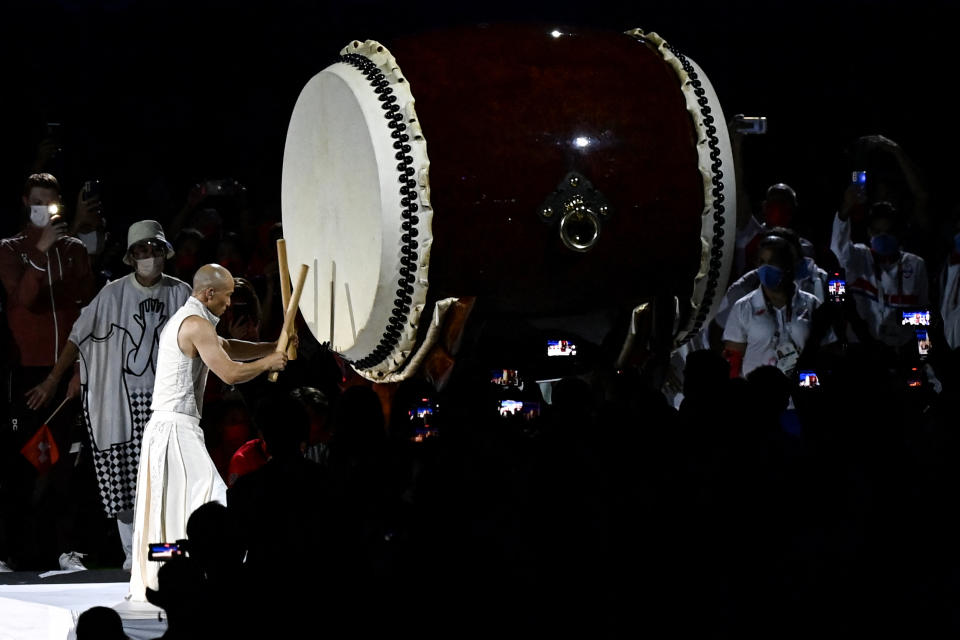 <p>A musician performs during the closing ceremony of the Tokyo 2020 Olympic Games, at the Olympic Stadium, in Tokyo, on August 8, 2021. (Photo by Jewel SAMAD / AFP) (Photo by JEWEL SAMAD/AFP via Getty Images)</p> 