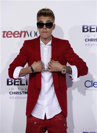 Singer Justin Bieber poses at the premiere of the documentary "Justin Bieber's Believe" in Los Angeles, California in this December 18, 2013 file photo. REUTERS/Mario Anzuoni/Files