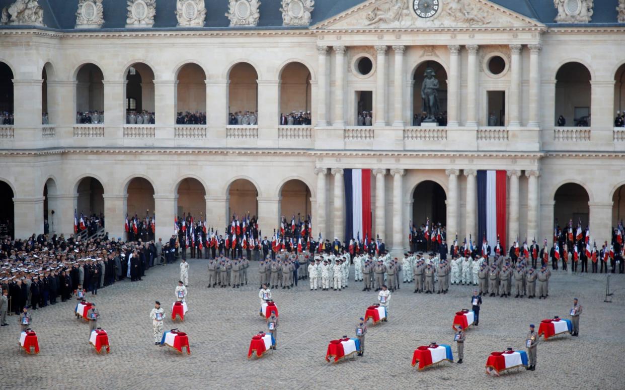 France pays tribute to 13 French soldiers who died in a helicopter accident in Mali - REUTERS