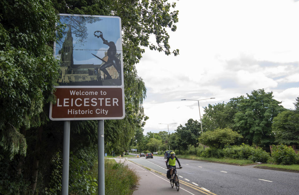 A sign welcomes people to the English city of Leicester, Sunday June 28, 2020, as the city is reported to be suffering from a spike in coronavirus cases. The Government has said it is supporting officials in Leicester in their battle against COVID-19, after a report the city could be subject to Britain's first local lockdown later this week. (Joe Giddens/PA via AP)