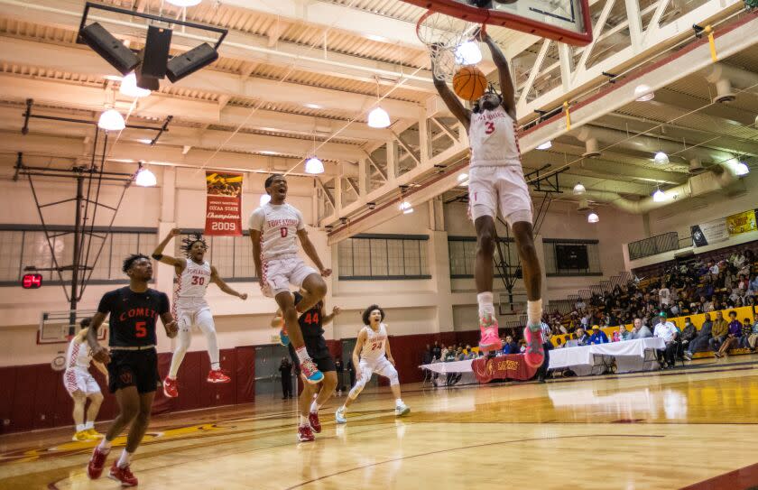 Pasadena, CA - February 18: Taft High School #3 Keyon Kensie Jr. scores at the end of the game on Saturday, Feb. 18, 2023, in Pasadena, CA. Taft High School won 55 to 46 during the City Section Open Division basketball semifinal.l (Francine Orr / Los Angeles Times)