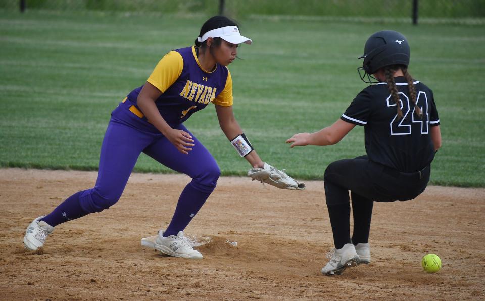 Nevada shortstop Lani Khounsourath (4) comes up to get the ball as Ames' Journey Wolfe (24) reaches second base safely during the first inning of the Cubs' 12-0 loss to the Little Cyclones at the Ames High Softball field Thursday, June 9, 2022, in Ames, Iowa.